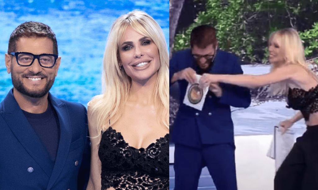 Lite Enrico Papi e Ilary Blasi all'Isola Lui vuole rubarle il lavoro. Ecco che sta succedendo a Mediaset