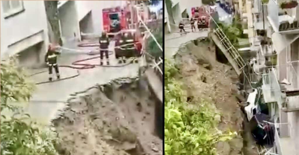 Crolla strada a Genova, auto contro i palazzi