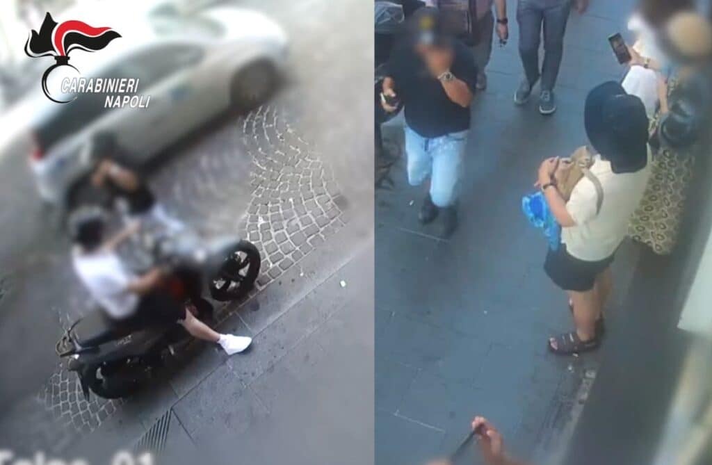 Nel VIDEO si vede uno dei due scippatori scendere dallo scooter e passare più volte davanti gli ignari turisti, per verificare da vicino l'effettivo valore dei loro orologi