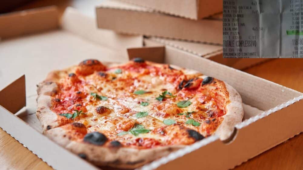 Nello scontrino da 118 euro, postato in rete dalla cliente, salta all'occhio la voce "Box Pizza" da 30 centesimi