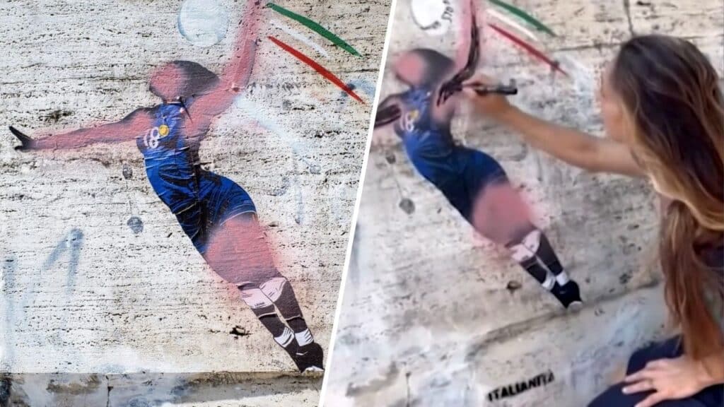 vandalizzato murale egonu passante ridipinge