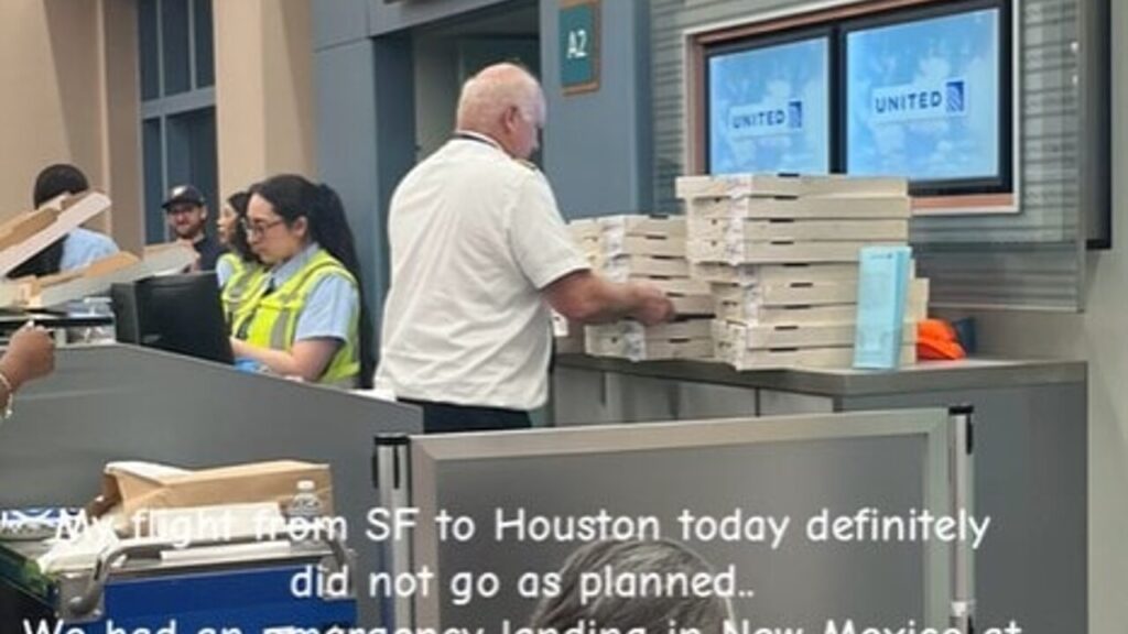 Rimangono bloccati per ore in aeroporto e il pilota ordina la pizza per tutti
