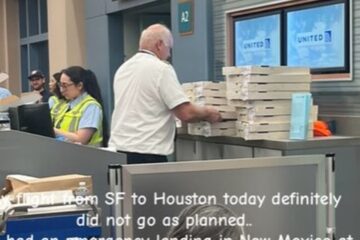 Rimangono bloccati per ore in aeroporto e il pilota ordina la pizza per tutti - Foto